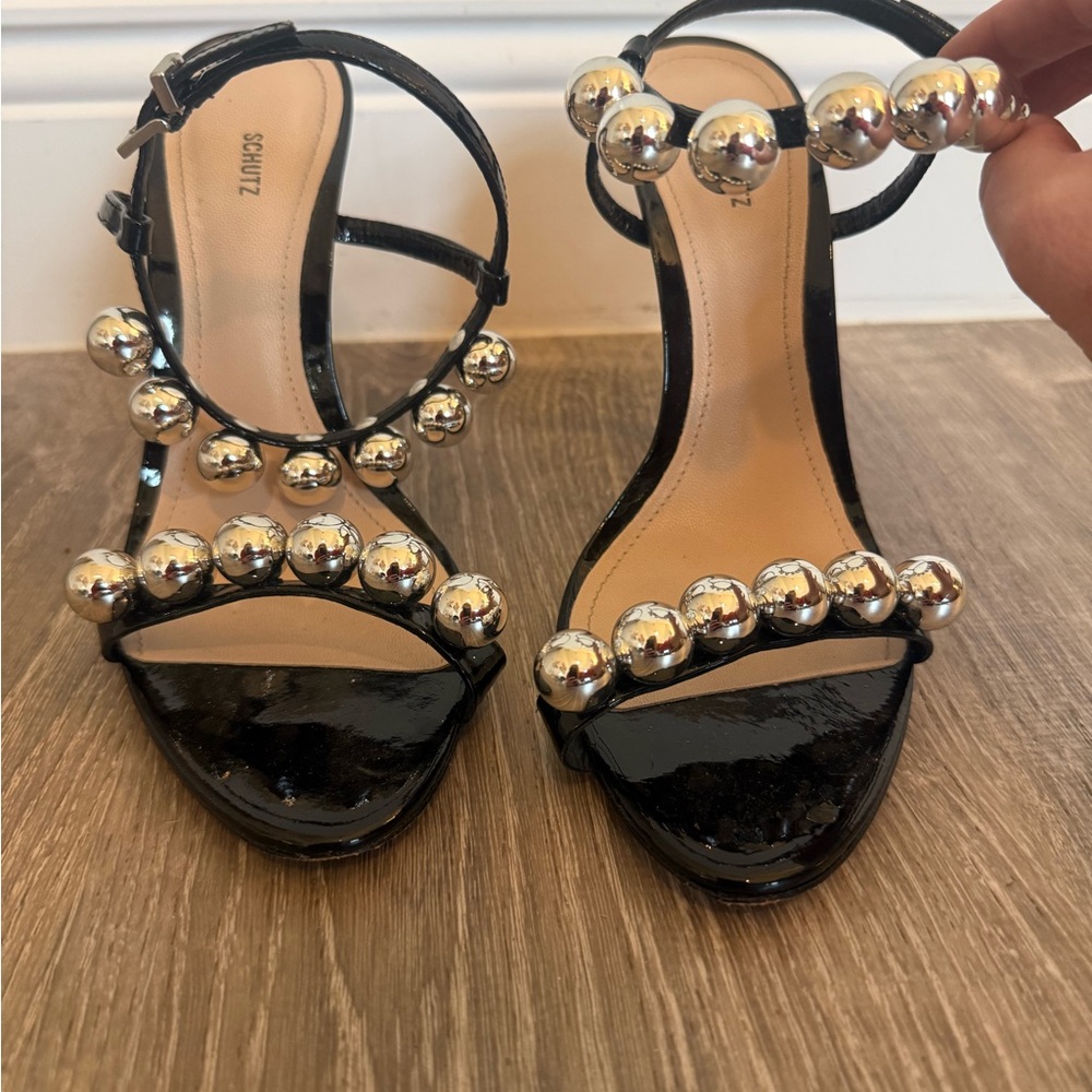 SCHUTZ Black and Silver Sandals with Metallic Accents